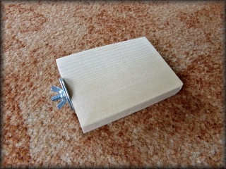 Dřevěné stupátko asi 7 x 9 cm s matkou